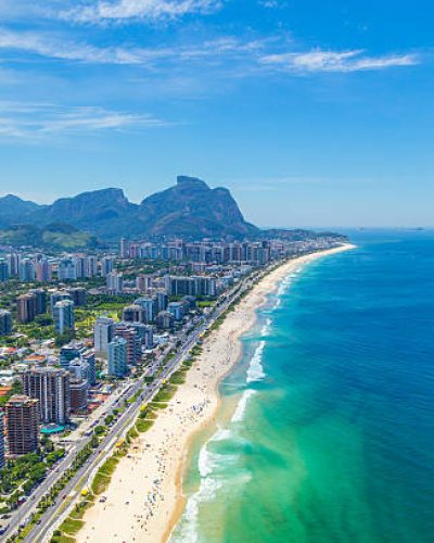Aerial View of the Barra da Tijuca Beach in Rio de Janeiro, Brazil. One of the more popular beaches in Rio on the summer, it's a famous spot for surf competitions and other waterspouts.